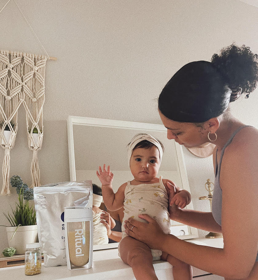 Ritual Mom with her baby and Essential Protein.